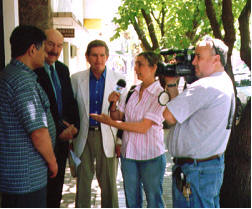 reporters interviewing Tony