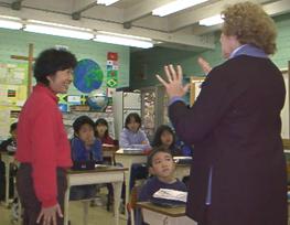 Marge with  Yumiko teaching the children at the School.