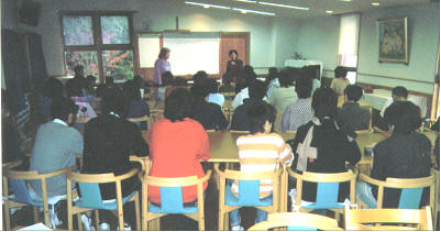 Marge teaches Japanese Christian School Class of students