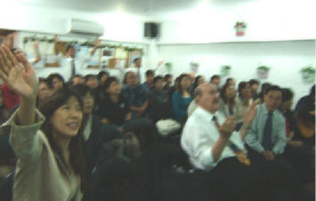 he local church is packed with standing room only in Okinawa