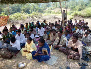 church meeting under a tree